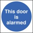 This door is alarmed sign