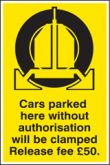 Cars parked clamped release fee £50 sign