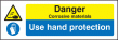 Danger corrosive materials use hand protection sign