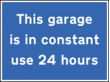 This garage is in constant use 24 hours sign