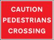 Caution pedestrians crossing sign