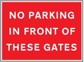 No parking in front of these gates sign