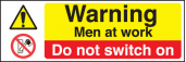 Men at work do not switch on sign
