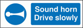 Sound horn drive slowly sign